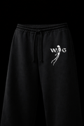Black sweatpants with a white logo on a black background